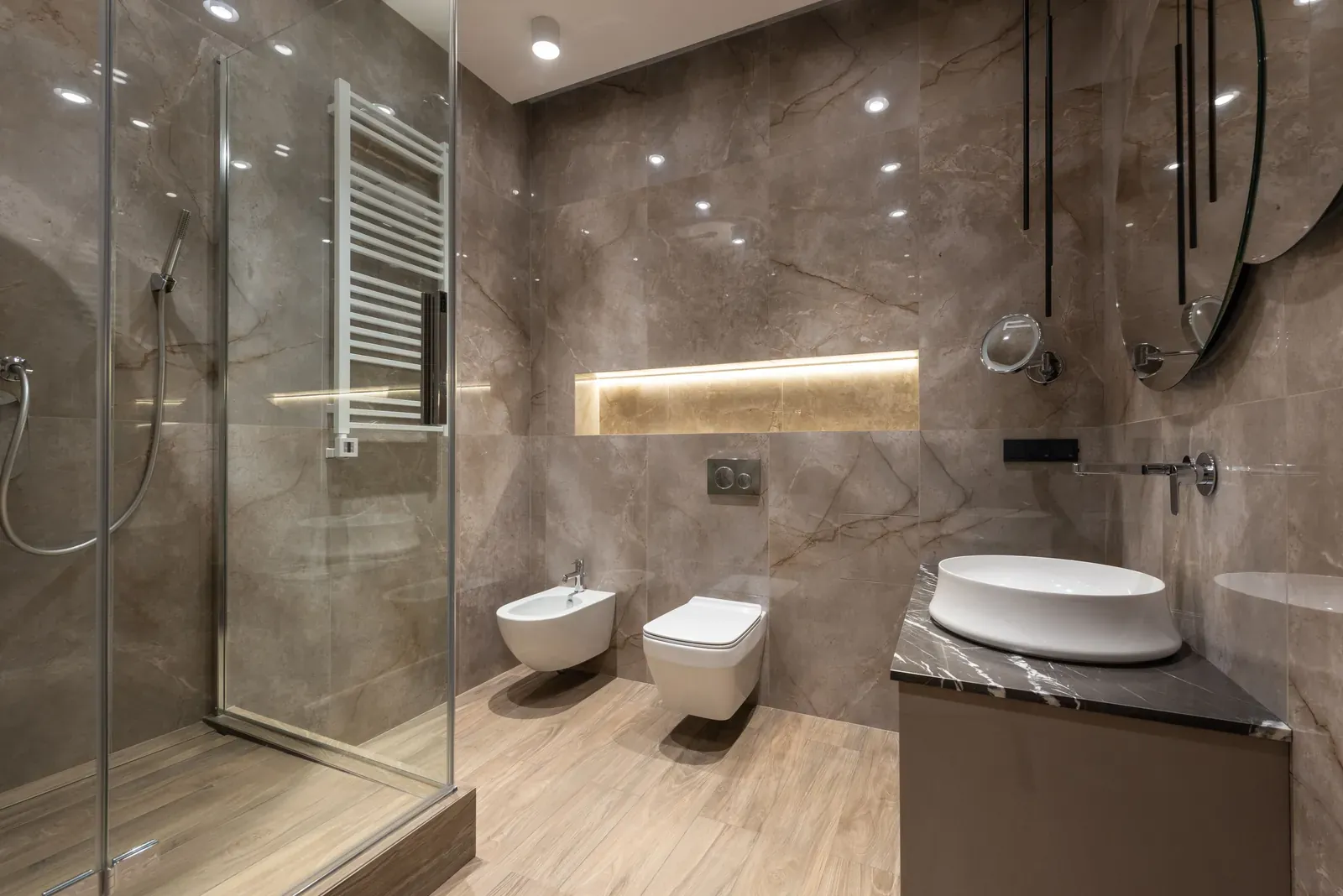 Marble-look porcelain bathroom with glass shower