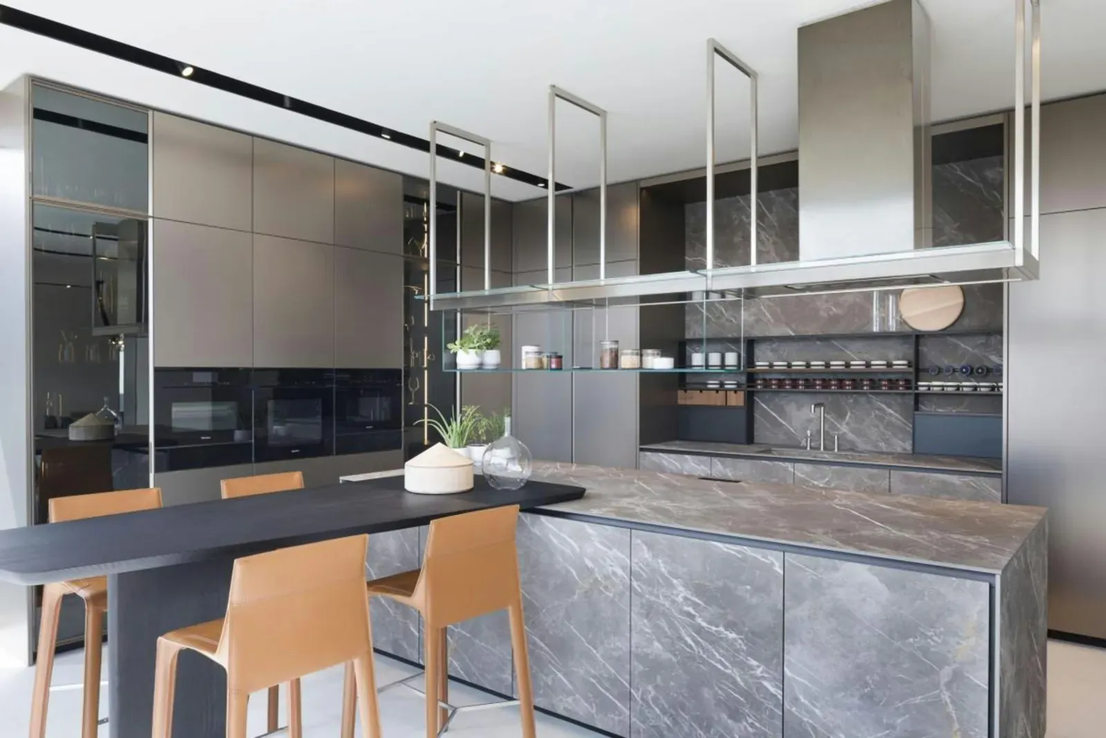 Modern flat-panel kitchen with gray marble-look island and tall cabinets