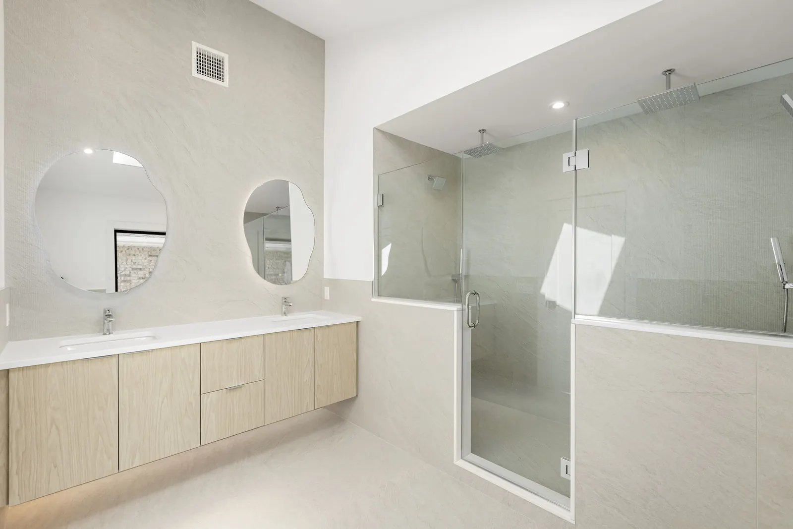 Clean tile edges in a white bathroom