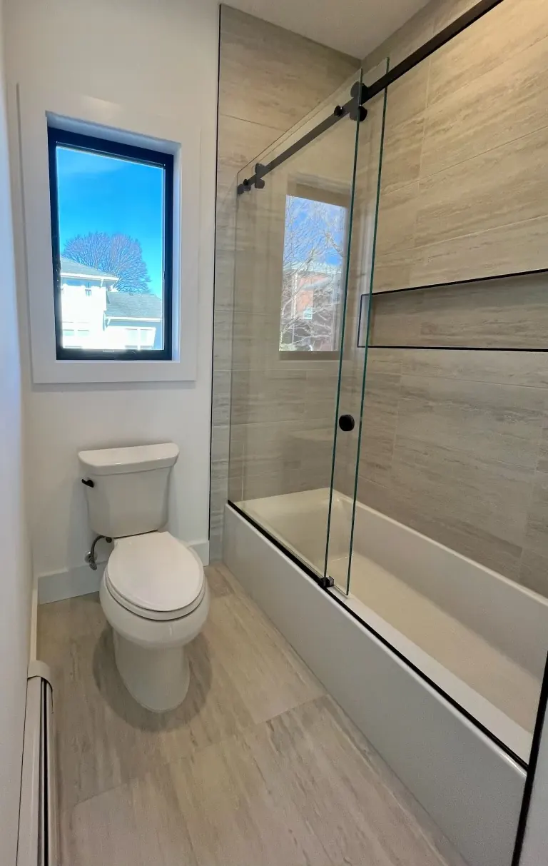 Walk-in shower with wood-look wall tile